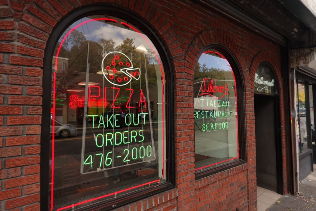 Brick storefront of Silvio’s Italian Restaurant on South Broadway