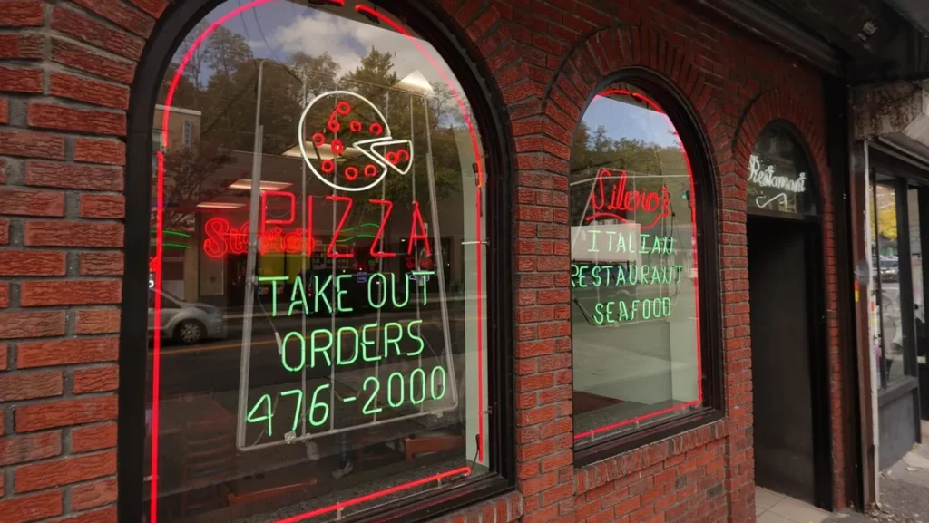 Brick storefront of Silvio's Italian Restaurant on South Broadway